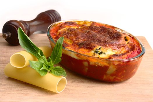 Cannelloni pasta with napoli and bechamel sauces. Baked golden brown and ready to eat