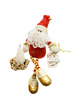 Santa Claus toy with Christmas tree on white