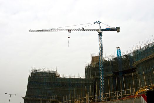 Building Under Construction in cloudy day