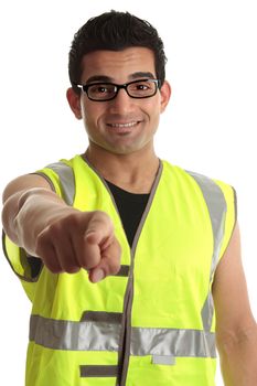 A smiling friendly builder, construction worker, or other tradesperson or labourer pointing his finger at you.  White background.