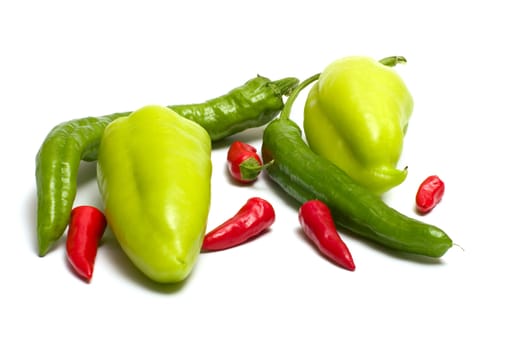 Red and green peppers isolated on white background.