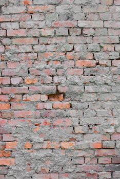 Cracked and old red brick wall texture