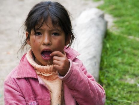 Curious local girl on Inka Trail in Peru.
