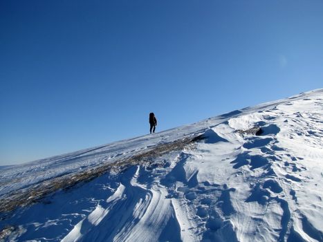 Mountains, caucasus, rocks, a relief, a landscape, the nature, a panorama, a landscape, a ridge, top, breed, the sky, reserve, a background, a kind, a route, a slope, peak, beauty, bright, a file, tourism, travel, winter, the tourist, the person, the guy, the man, sports, an ascension, the sun, snow