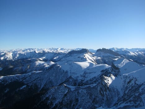 Mountains, caucasus, rocks, a relief, a landscape, the nature, a panorama, a landscape, a ridge, top, breed, the sky, reserve, a background, a kind, a route, a slope, peak, beauty, bright, a file, tourism, travel, winter, the sun, snow, the Main Caucasian ridge, wood, trees