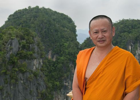 Monk at Tiger Cave (Wat Tham Suea) Temple in Krabi, Thailand.