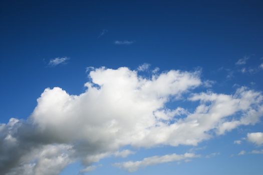 Cumulus cloud formation in blue sky.