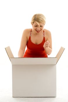 Happy girl in red dress with big blank white box