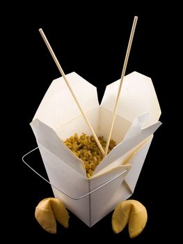 Chinese take out food isolated on a black background