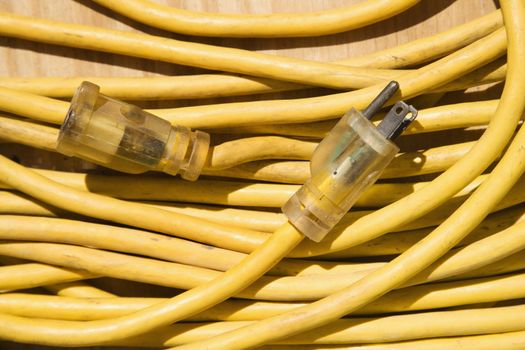 Yellow electric extension cord.