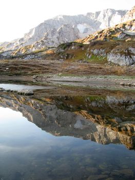 The nature; caucasus; mountains; top; a ridge; a panorama; a landscape; lake; water; a reservoir; peaks; the sky; reflexion; rocks; the bright; a background; a kind; beauty; reserve; morning, stones, a bottom, a glacier, snow