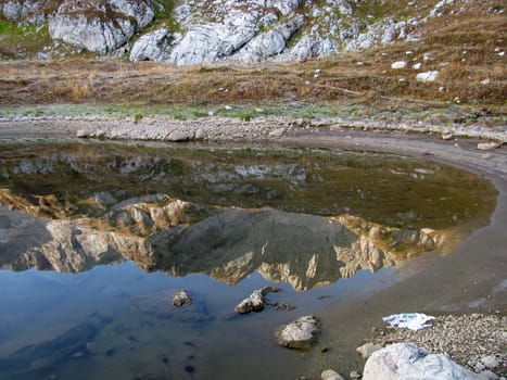 The nature; caucasus; mountains; top; a ridge; a panorama; a landscape; lake; water; a reservoir; peaks; the sky; reflexion; rocks; the bright; a background; a kind; beauty; reserve; morning, stones, a bottom, a glacier, snow