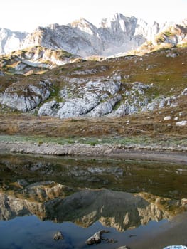 The nature; caucasus; mountains; top; a ridge; a panorama; a landscape; lake; water; a reservoir; peaks; the sky; reflexion; rocks; the bright; a background; a kind; beauty; reserve; morning, stones, a bottom, a glacier, snow