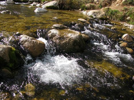 The mountain; the river; a stream; water; a current; the cascade; a channel; a stream; the bright; a background; a kind; the nature; caucasus; a landscape; the pure; stones; raging, glacial