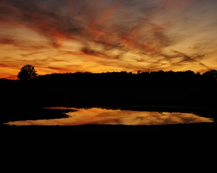 A sunset over a flooded field in Clare, Michigan.
