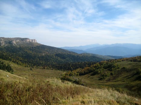 Mountains, caucasus, rocks, a relief, a landscape, wood, the nature, a panorama, a landscape, a ridge, top, breed, the sky, reserve, a background, a kind, a structure, trees, a slope, beauty, bright, a file, clouds, a grass, the Alpine meadows, tourism, travel, rest, gorge, a canyon