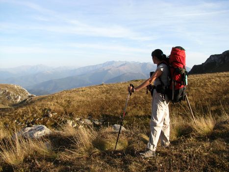 Mountains, caucasus, rocks, a relief, a landscape, the nature, a panorama, a landscape, a ridge, top, breed, the sky, reserve, a background, a kind, a structure, a slope, peak, beauty, bright, a file, clouds, snow, the girl, sports, the tourist, a grass, the Alpine meadows, tourism, travel, productive leisure