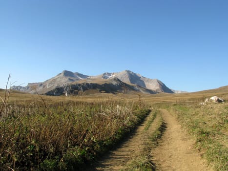 Mountains, caucasus, rocks, a relief, a landscape, the nature, a panorama, a landscape, a ridge, top, breed, the sky, reserve, a background, a kind, a route, the Alpine meadows, a glacier, snow, a track, a slope, peak, beauty, bright, a file, a grass, tourism, travel, autumnt