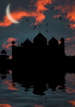 islamic mosque at sunset in water ripples