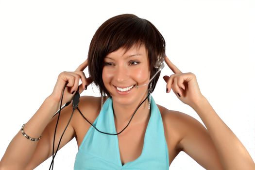 young girl with head phones isolated over white