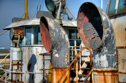 Rusted Boat at Shipyard, in the Riachuelo in La Boca, Buenos Aires, Argentina. The neighborhood of La Boca is a popular tourist destination in Argentina.