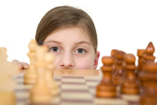 Girl looking chess on the white background