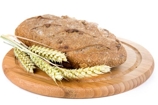 nut bread and grain on a cutting board