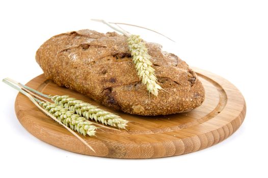nut bread and grain on a cutting board