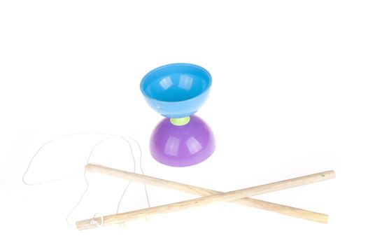 a colorful diabolo with sticks