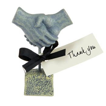handshaking statue, made of stone, with a tahnk you card
