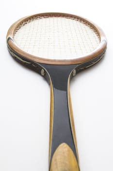 Vintage wood tennis racket viewed from the handel point of view
