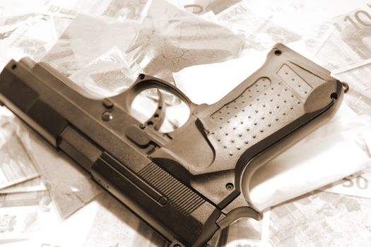 gun drugs and money showing a dangerous side to life