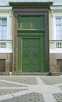 One of entrances to Building of General Army Staff at Palace Square in Saint Petersburg, Russia. Classicism-epoch style.