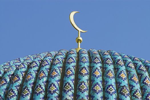 The top of the tiled dome With Arabic mosaics of the ancient mosque in Saint Petersburg, Russia.