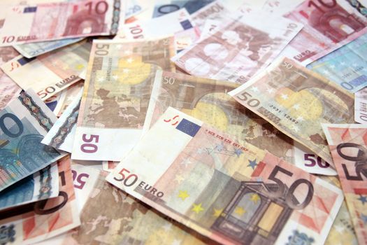 european money banknotes spread out on the ground