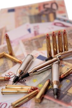 bullets and money showing a dangerous side to life