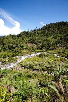 A tropical mountain landscape in Papua, Indonesia