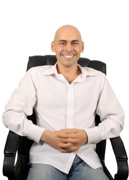 bold handsome man in armchair isolated over white