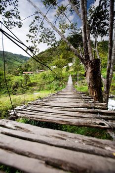 An old narrow hanging bridge