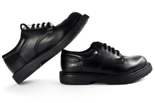 High resolution photo of a pair of black men's shoes.