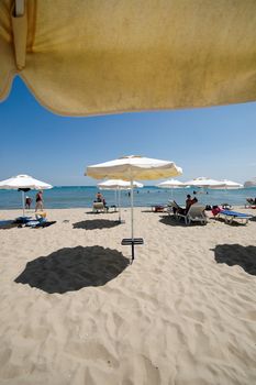 Umbrellas and sand.