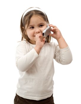 A young child using a cell phone, isolated against a white background