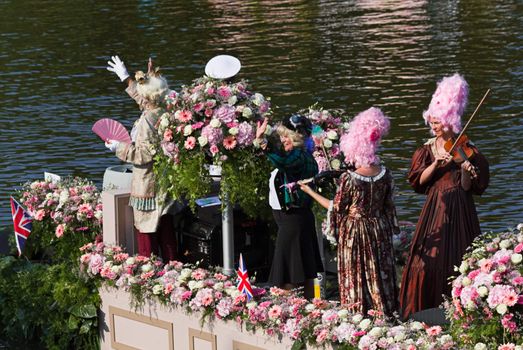 VLAARDINGEN, THE NETHERLANDS - JULI 2010: Beautiful flower boats in the unique annual Westland Floating Parade Juli 30, 2010, Vlaardingen, the Netherlands.

