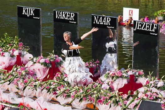 VLAARDINGEN, THE NETHERLANDS - JULI 2010: Beautiful flower boats in the unique annual Westland Floating Parade Juli 30, 2010, Vlaardingen, the Netherlands.

