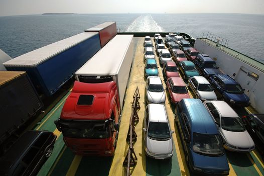 Cars are parked on a ferry