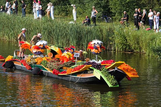 VLAARDINGEN, THE NETHERLANDS - JULI 2010: Beautiful flower boats in the unique annual Westland Floating Parade Juli 30, 2010, Vlaardingen, the Netherlands.

