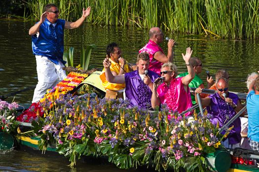 VLAARDINGEN, THE NETHERLANDS - JULI 2010: Beautiful flower boats in the unique annual Westland Floating Parade Juli 30, 2010, Vlaardingen, the Netherlands.

