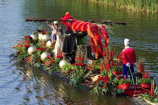 VLAARDINGEN, THE NETHERLANDS - JULI 2010: Beautiful flower boats in the unique annual Westland Floating Parade Juli 30, 2010, Vlaardingen, the Netherlands.

