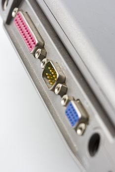 back side of a laptop with selective focus connection ports