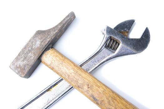 isolated tools. a hammer and a wrench tool